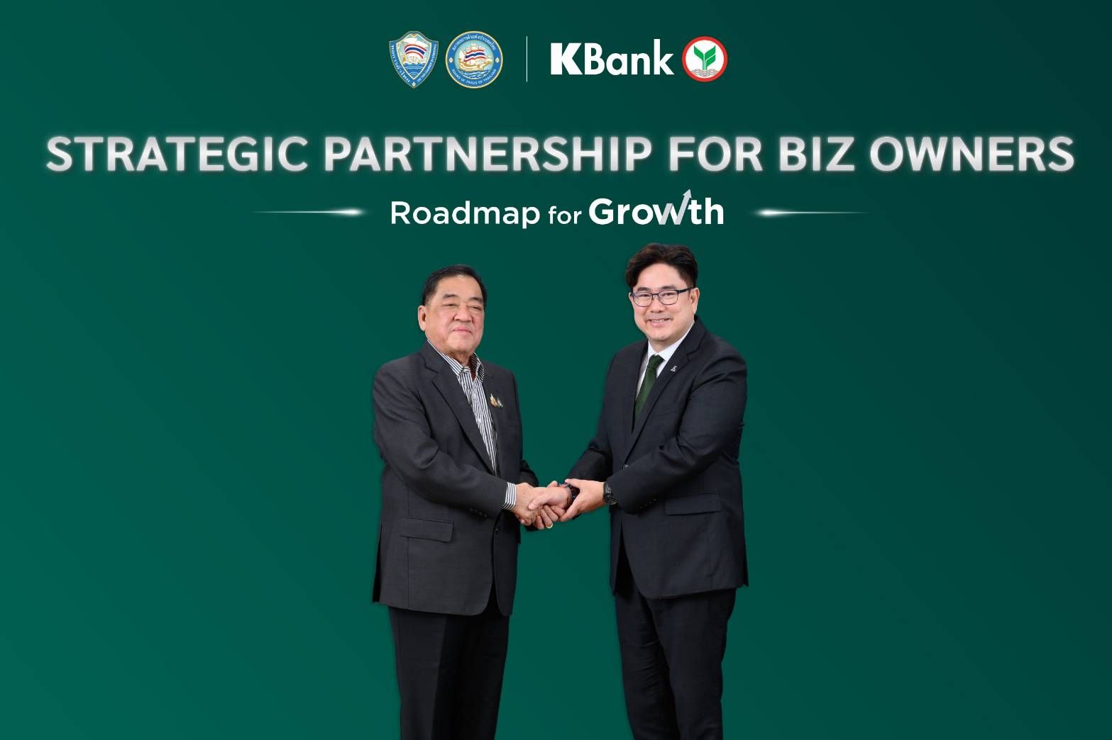 Two businessmen shaking hands under a KBank 'Strategic Partnership for Biz Owners' banner.
