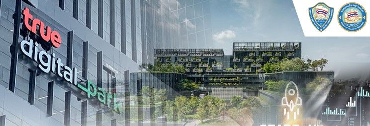 True Digital Park building sign with futuristic green architecture and a launching rocket.