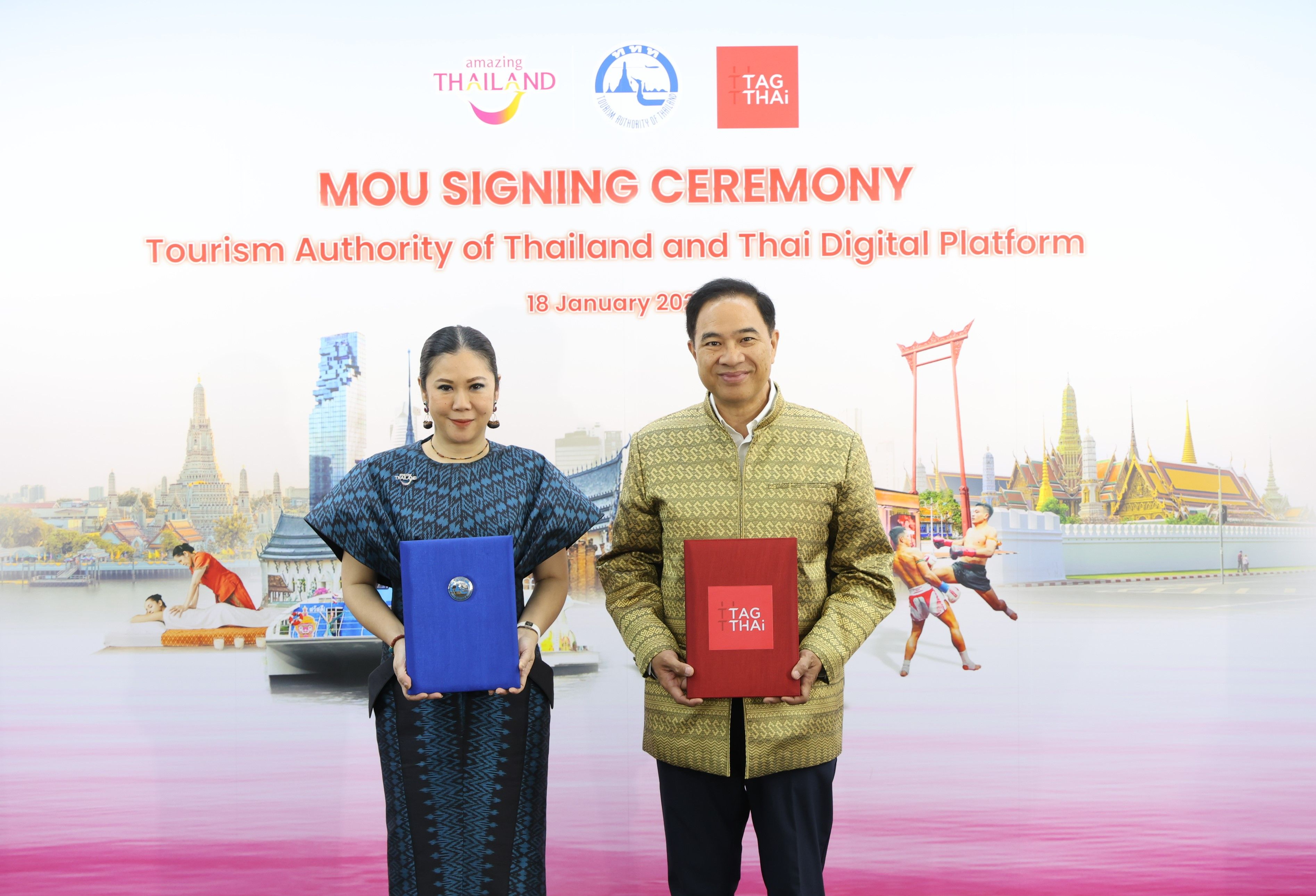 MOU signing between Tourism Authority of Thailand and Thai Digital Platform with two officials.