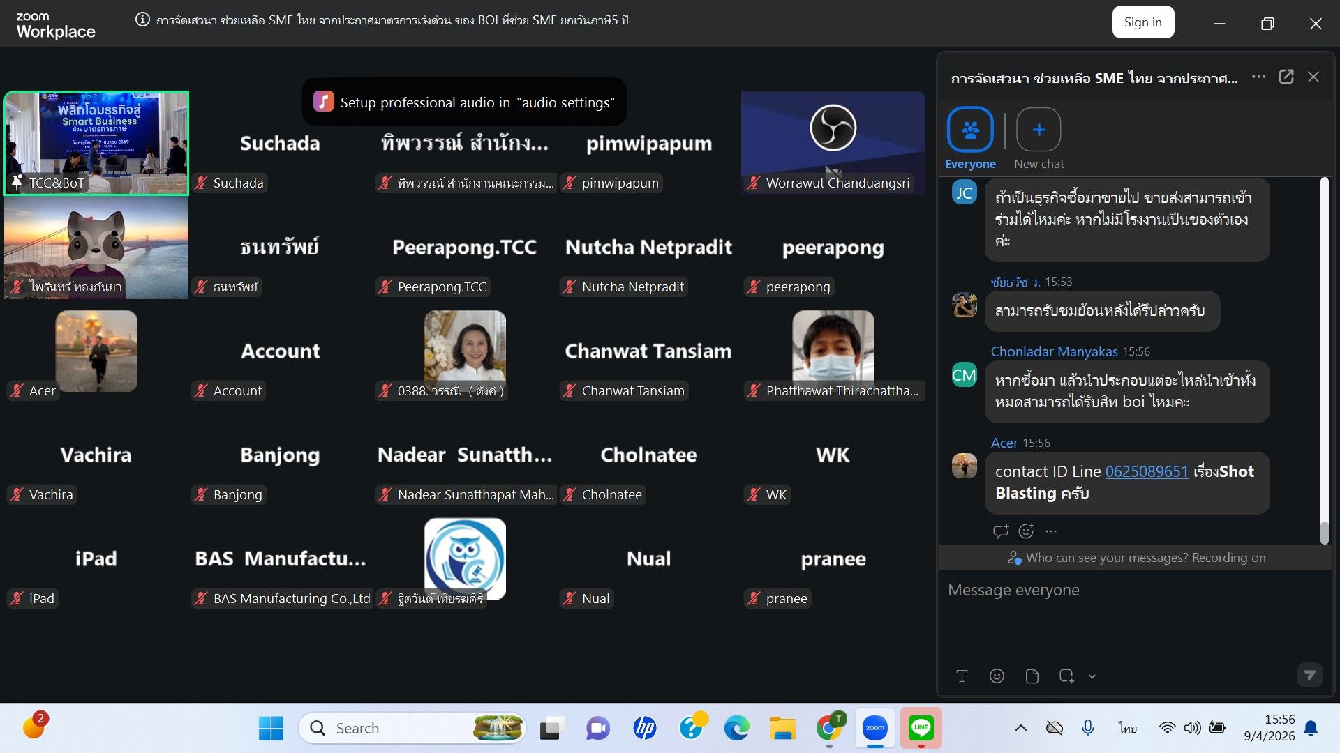 Video conferencing screen displaying multiple participants, chat panel, and dark mode interface.